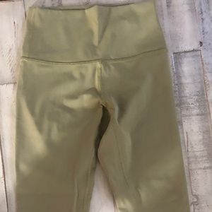 Lululemon bronze green high waist leggings. Size 4